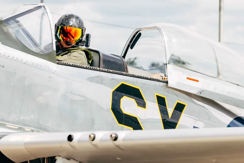 Pilot with Horus Helmet on a Rotary Plane